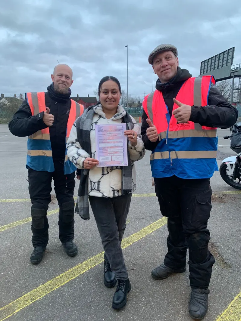 A student with a pass certificate between two instructors